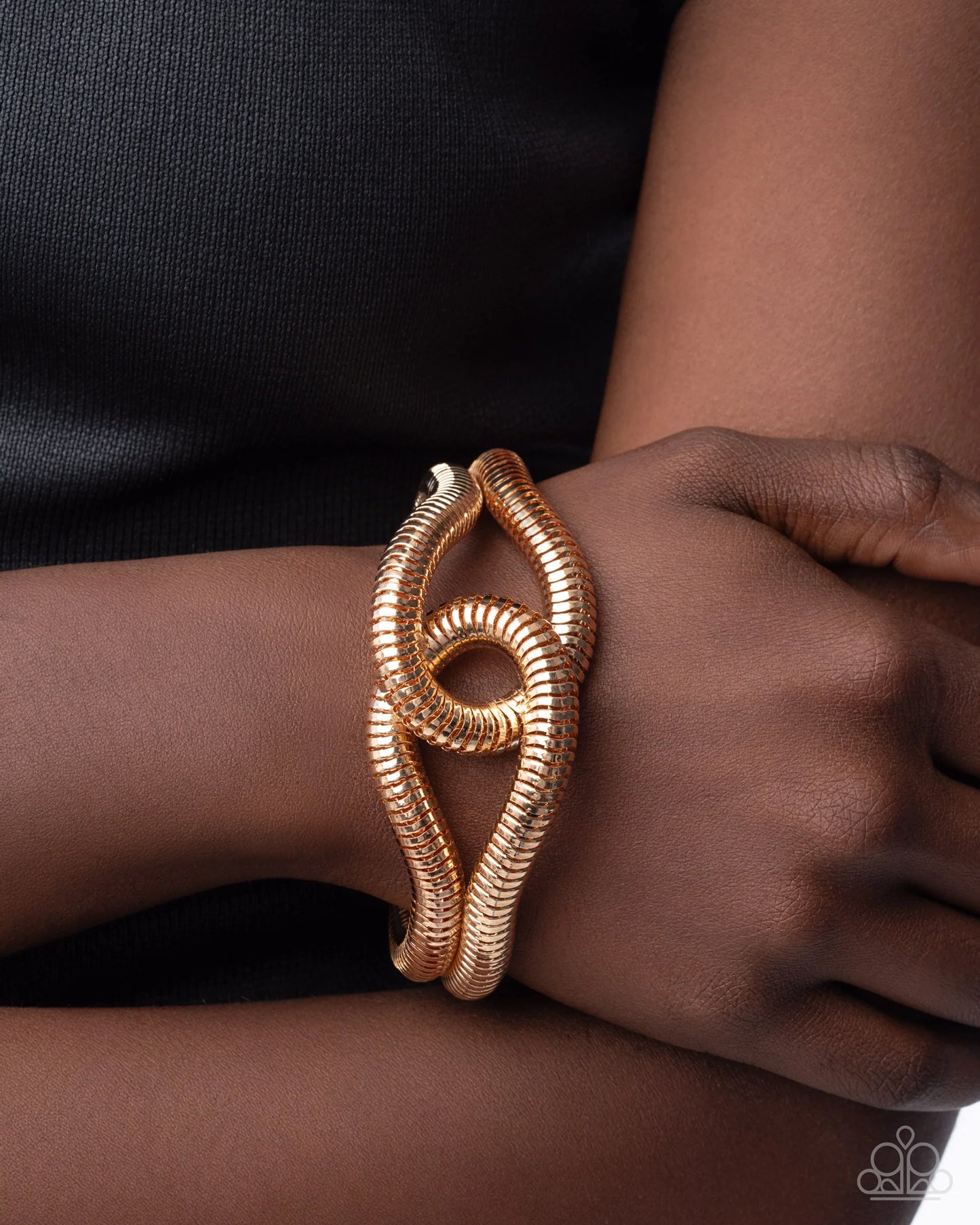 Interlocked Ignition - gold - Paparazzi bracelet