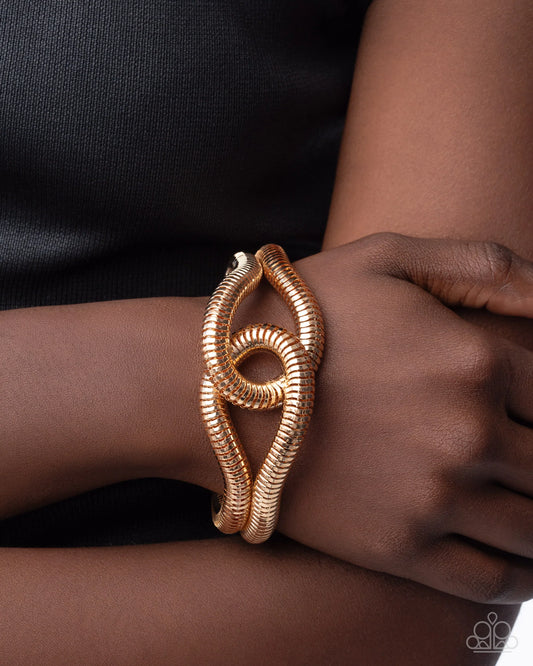 Interlocked Ignition - gold - Paparazzi bracelet
