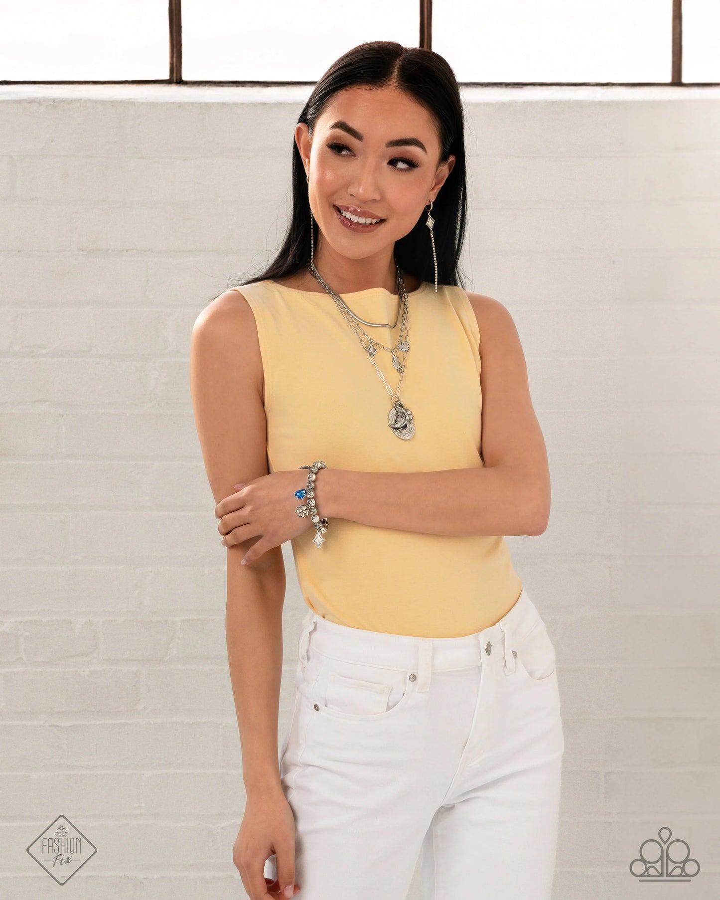 Necklace: "Stirring Season - Blue" Hoop Earring: "Soft-Hearted Sentiment - White" Bracelet: "Spirited Sentiment - Blue" Necklace: "Sentimental Sunset - White"