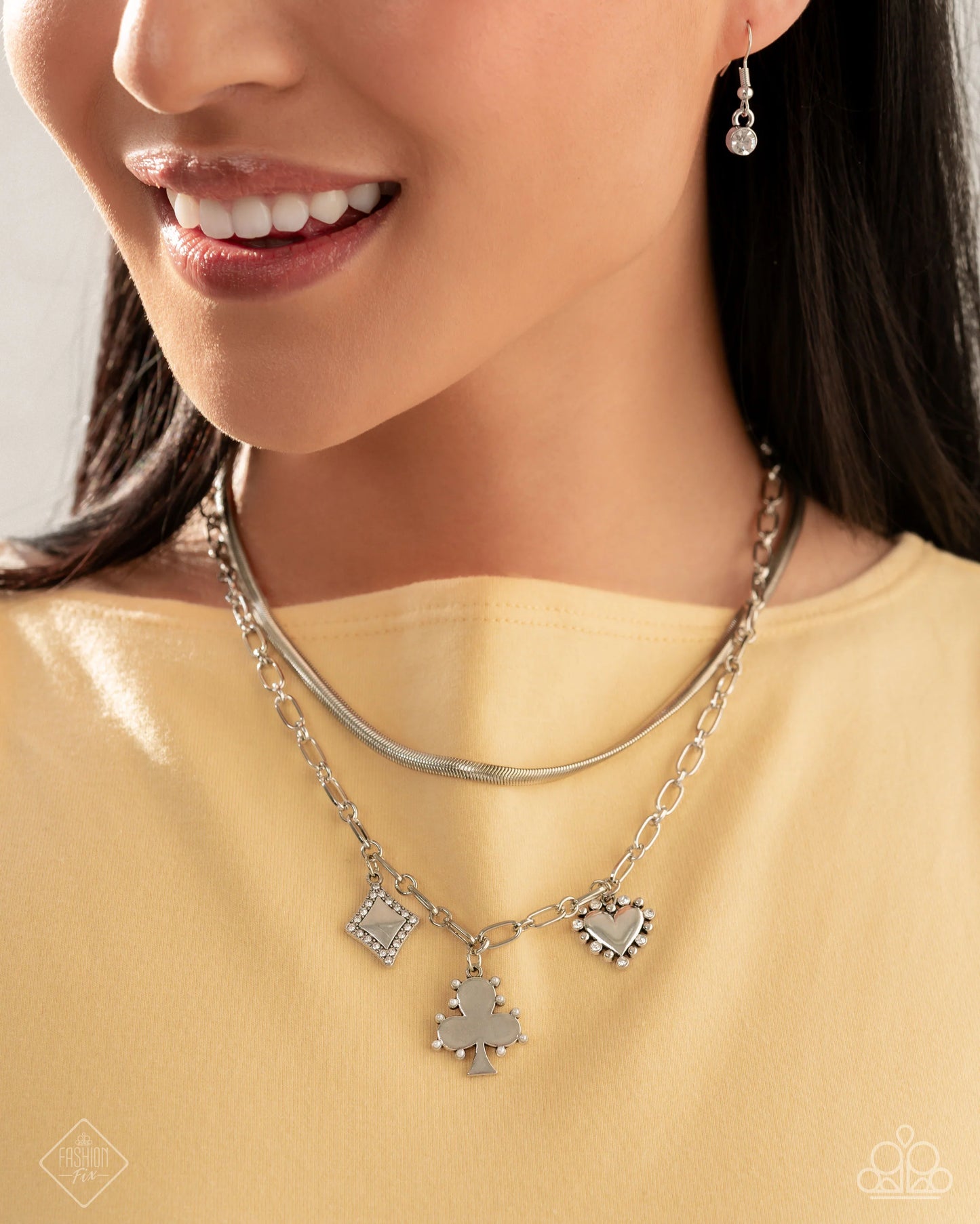 Necklace: "Stirring Season - Blue" Hoop Earring: "Soft-Hearted Sentiment - White" Bracelet: "Spirited Sentiment - Blue" Necklace: "Sentimental Sunset - White"